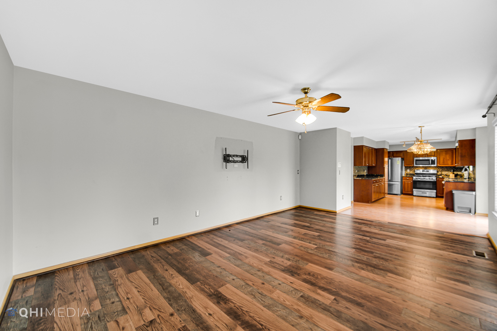 21432 Georgetown Drive Plainfield, IL 60544 - Photo 8 of 24 a view of an empty room and wooden floor