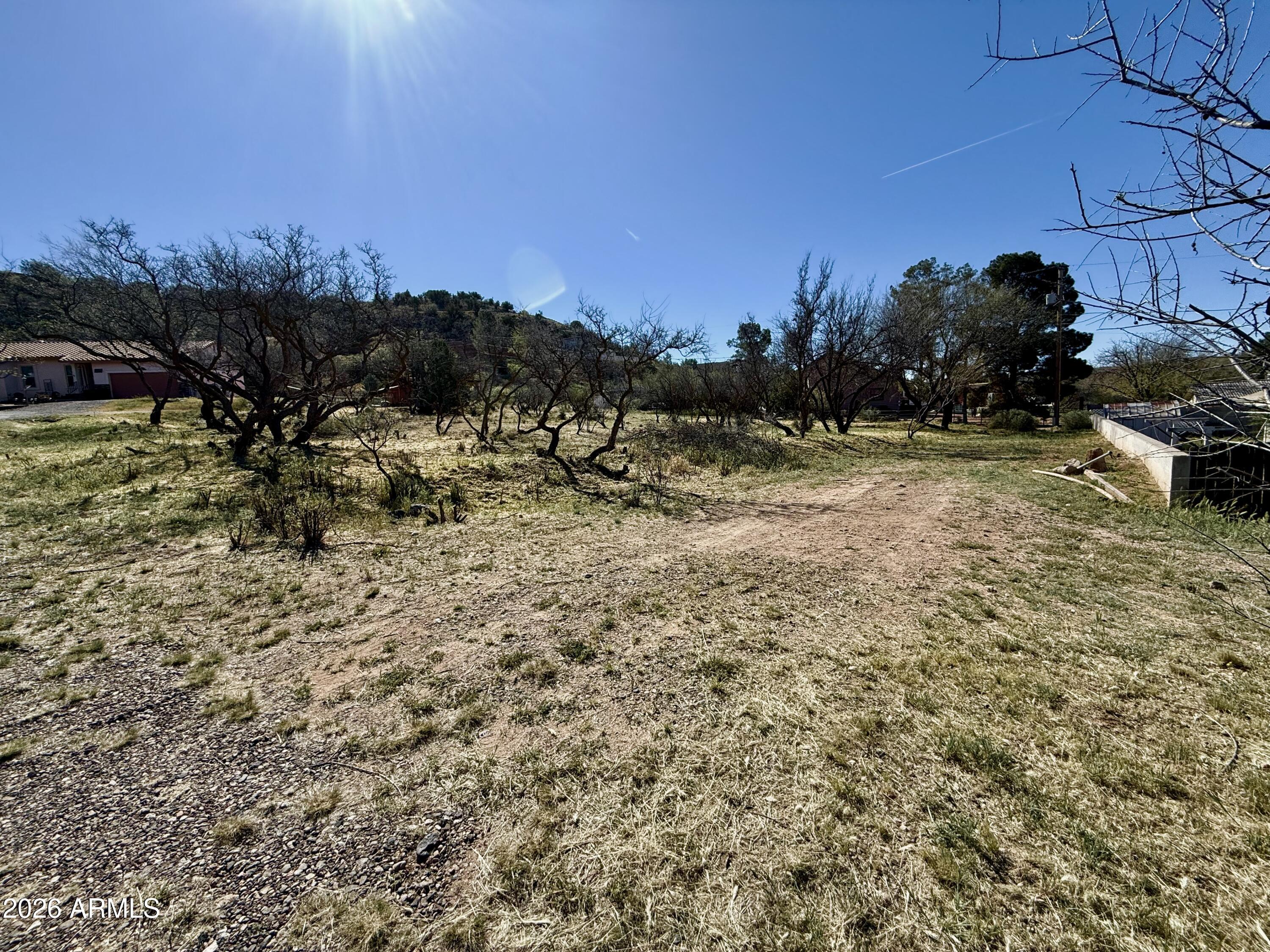 4245 East Sioux Way, Unit 43 Rimrock, AZ 86335 - Photo 2 of 9 a view of a yard with a tree