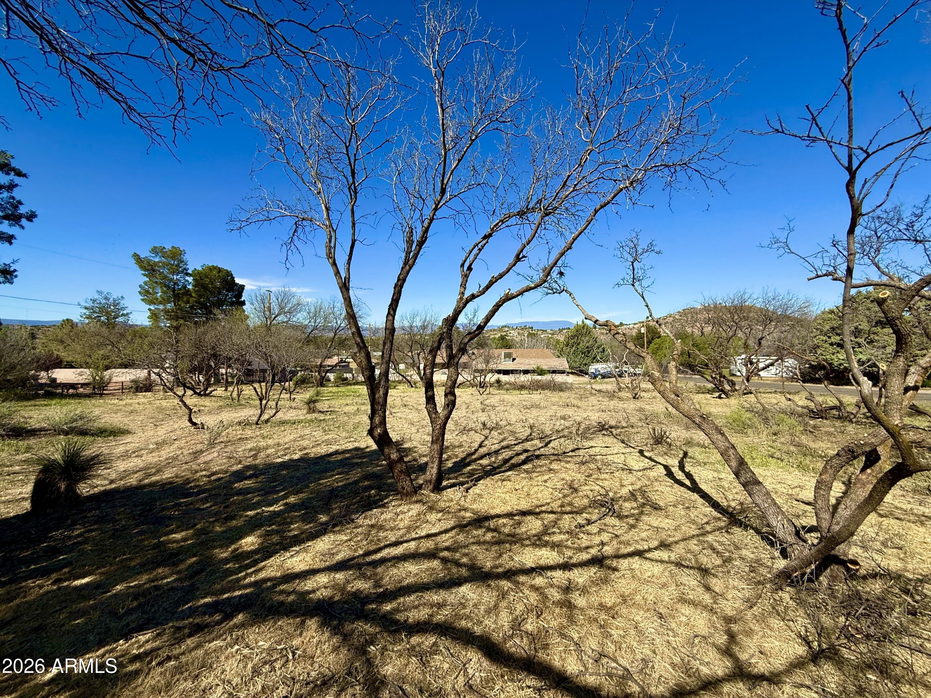 4245 East Sioux Way, Unit 43 Rimrock, AZ 86335 - Photo 5 of 9 a view of a yard with wooden fence