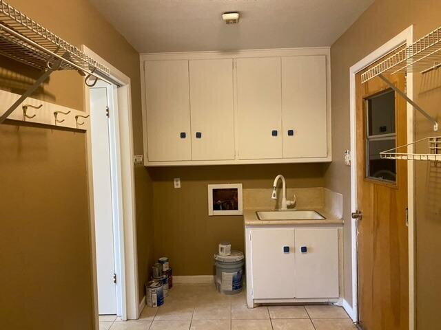 3011 55th Street Lubbock, TX 79413 - Photo 20 of 25 a bathroom with a sink vanity and mirror