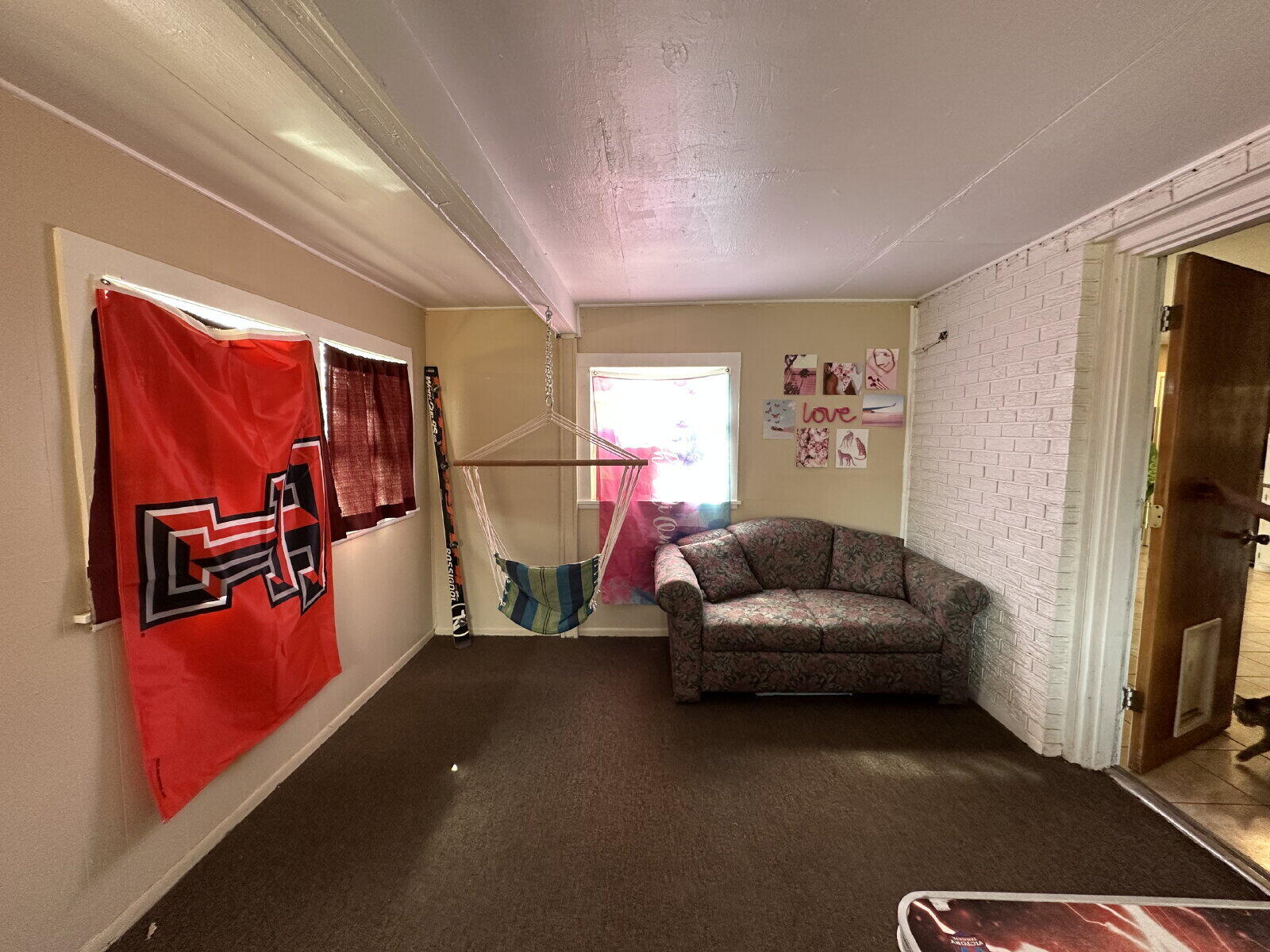 3011 55th Street Lubbock, TX 79413 - Photo 23 of 25 a living room with furniture and a window