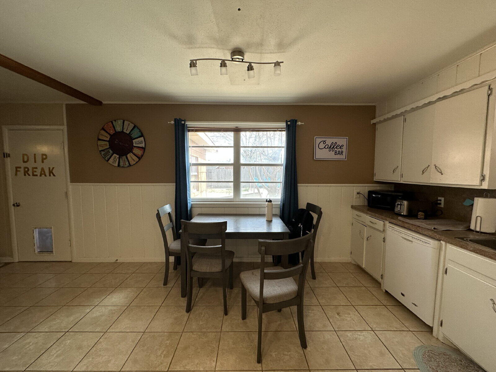 3011 55th Street Lubbock, TX 79413 - Photo 5 of 25 a view of a dining room with furniture and window