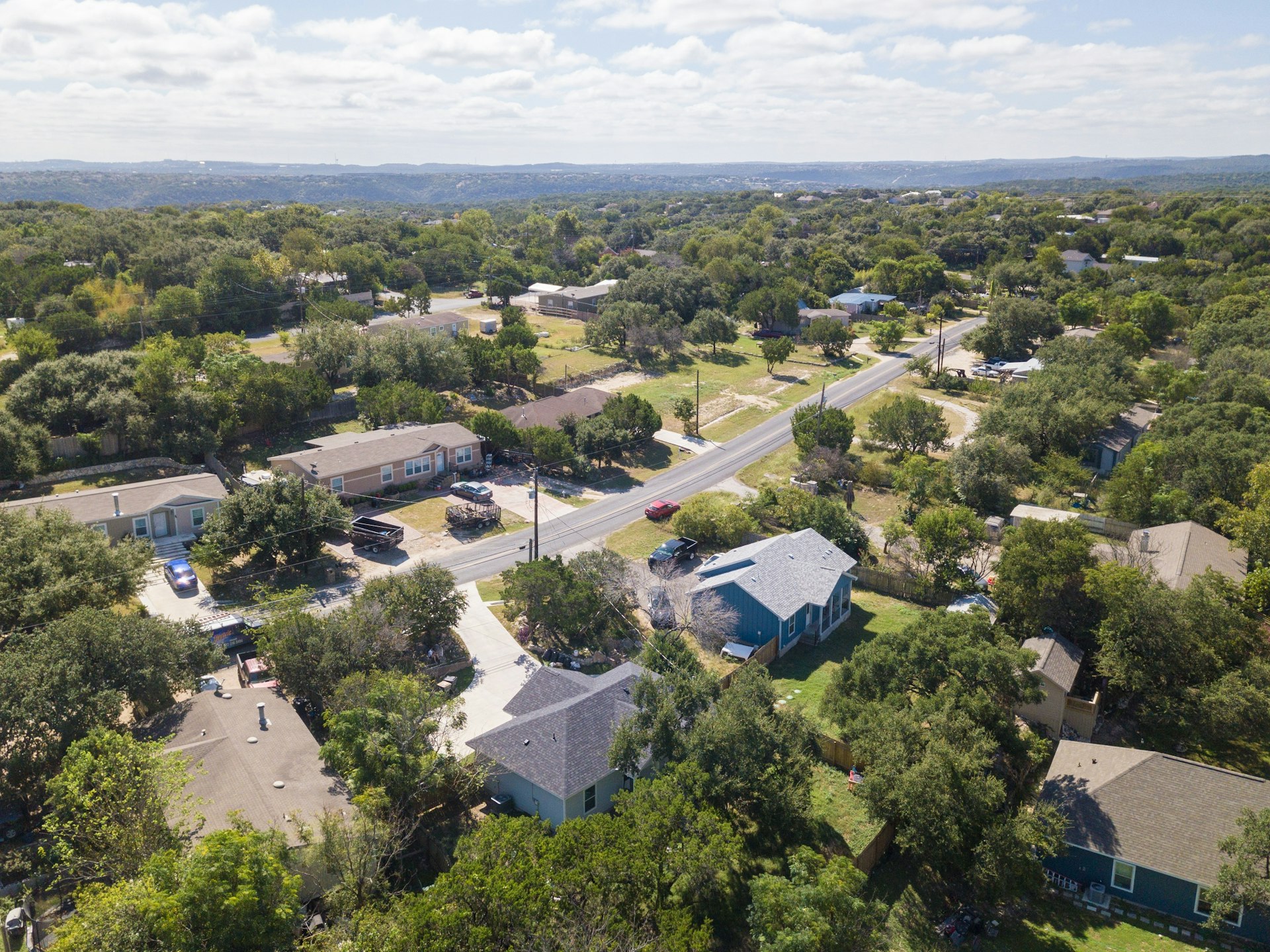 14922 Running Deer Trail Austin, TX 78734 - Photo 2 of 31 Drone / aerial view featuring a residential view