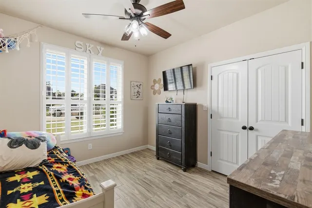 a room with furniture and a window