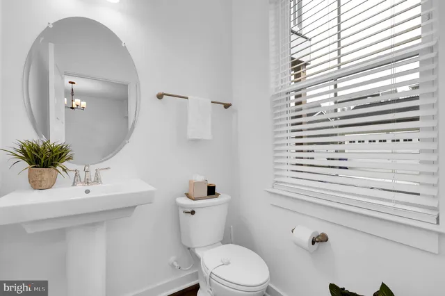 a spacious bedroom with a bed and a couch