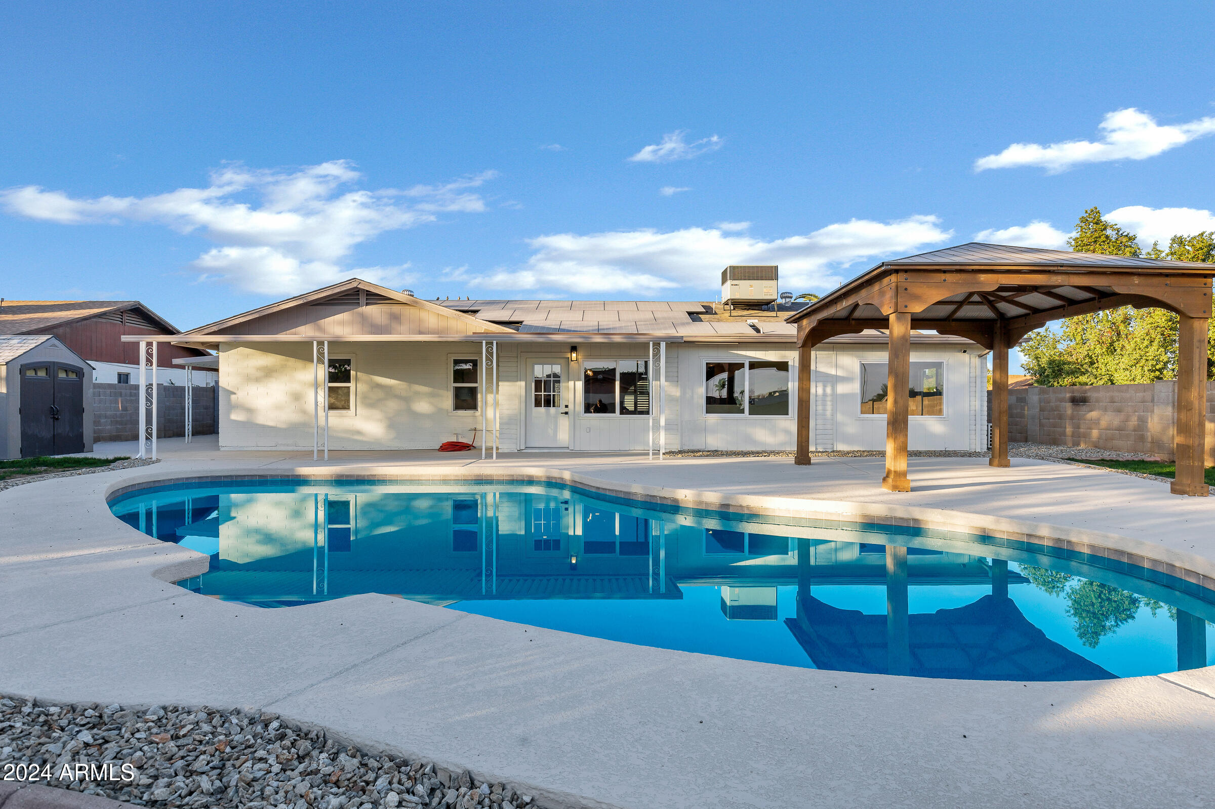 3701 West Phelps Road Phoenix, AZ 85053 - Photo 42 of 46 a front view of a house with swimming pool