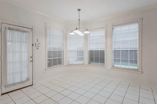 a view of a room with windows