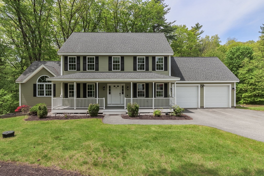 78 Tavern Road Groton, MA 01450 - Photo 1 of 41 a aerial view of a house with sitting area and garden