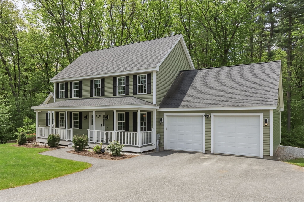 78 Tavern Road Groton, MA 01450 - Photo 2 of 41 front view of a house with a yard