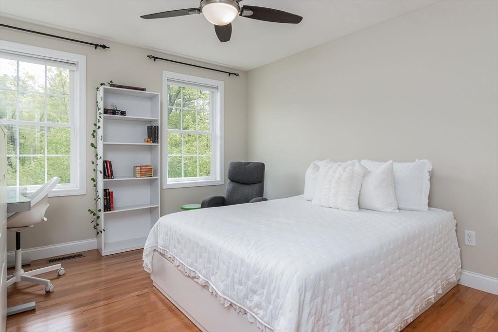 78 Tavern Road Groton, MA 01450 - Photo 23 of 41 a bedroom with a large bed and a large window