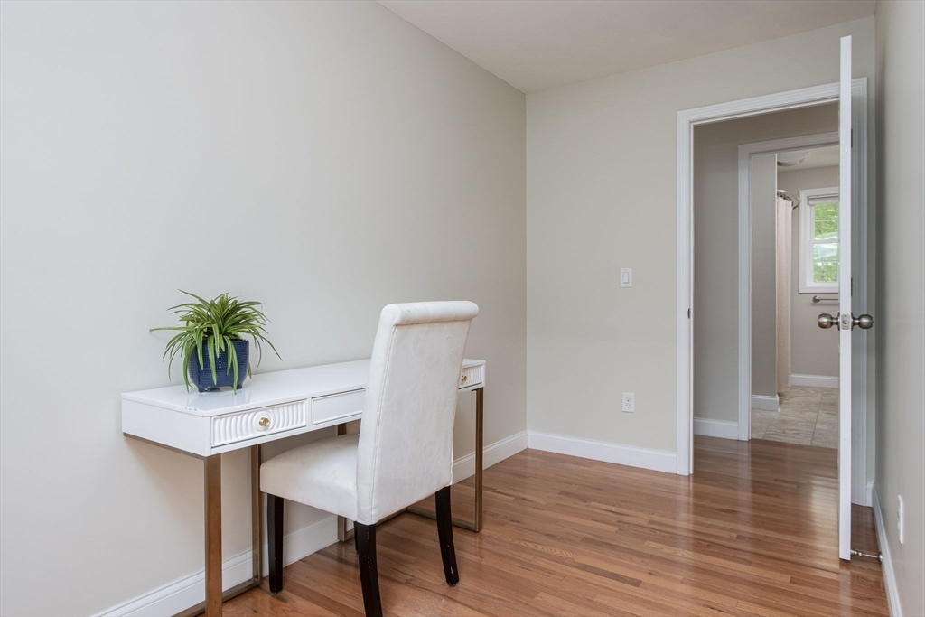 78 Tavern Road Groton, MA 01450 - Photo 25 of 41 a workspace with furniture and wooden floor