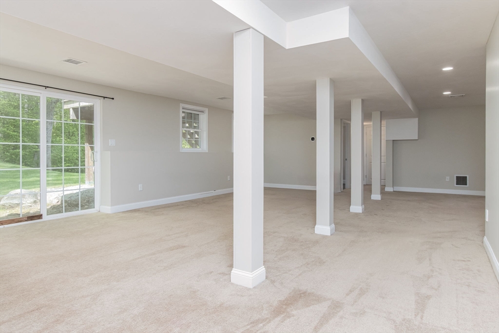 78 Tavern Road Groton, MA 01450 - Photo 27 of 41 a view of an empty room with a window