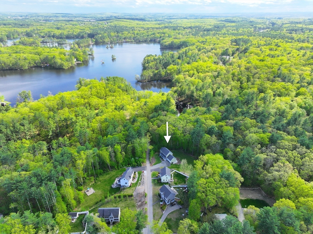 78 Tavern Road Groton, MA 01450 - Photo 37 of 41 a view of a lake with a houses