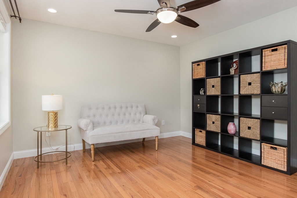 78 Tavern Road Groton, MA 01450 - Photo 8 of 41 a living room with furniture and a wooden floor