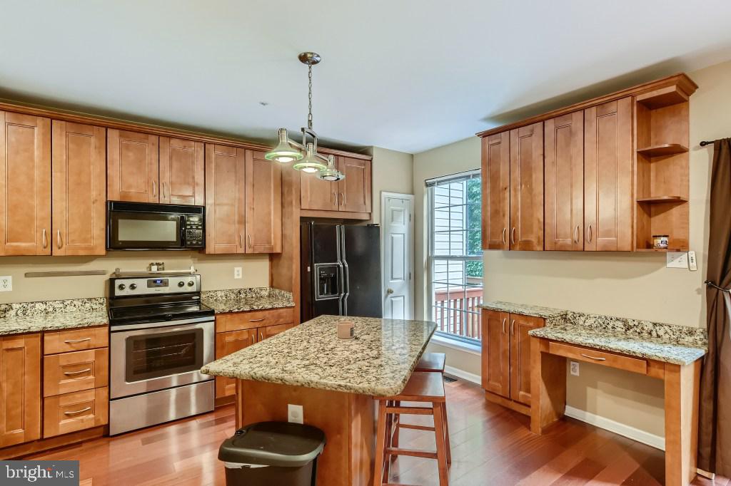 5217 Red Hill Way Rosedale, MD 21237 - Photo 3 of 28 Kitchen w/ island & granite countertops