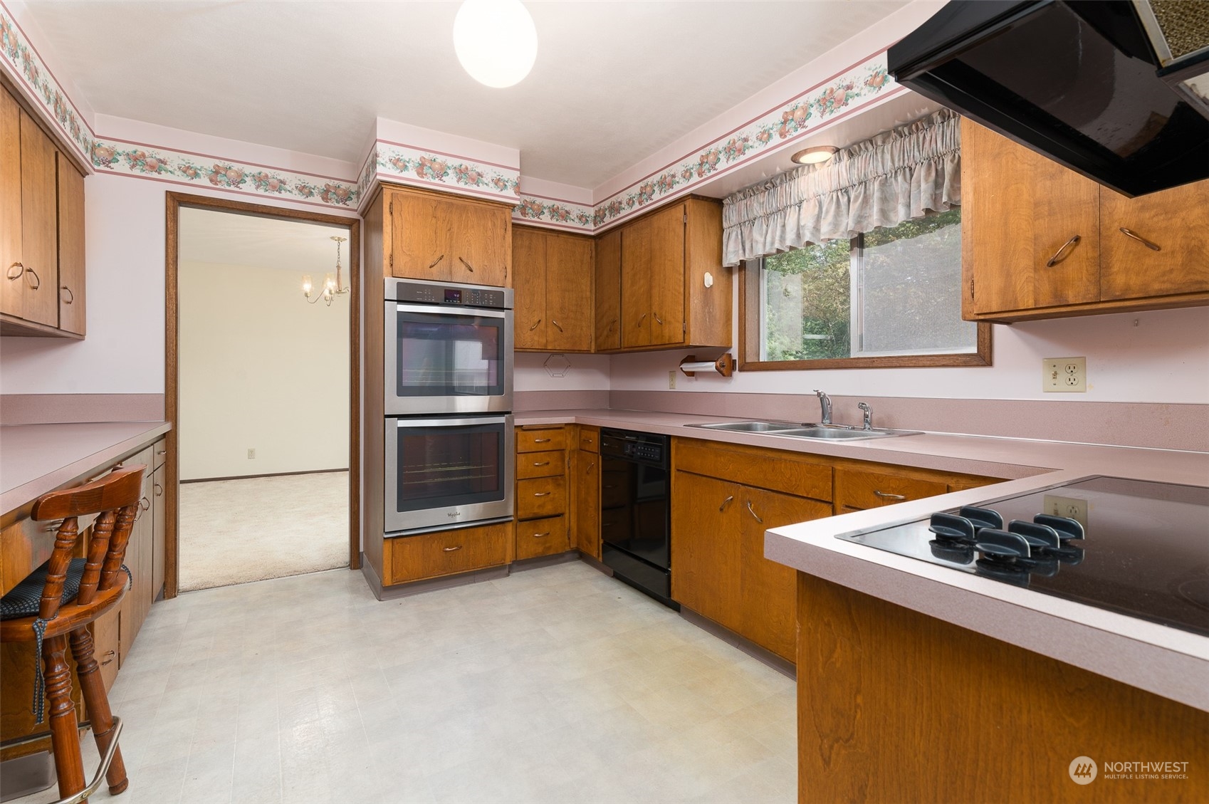 1275 West Axton Road Ferndale, WA 98248 - Photo 12 of 30 a kitchen with stainless steel appliances granite countertop a sink stove and refrigerator