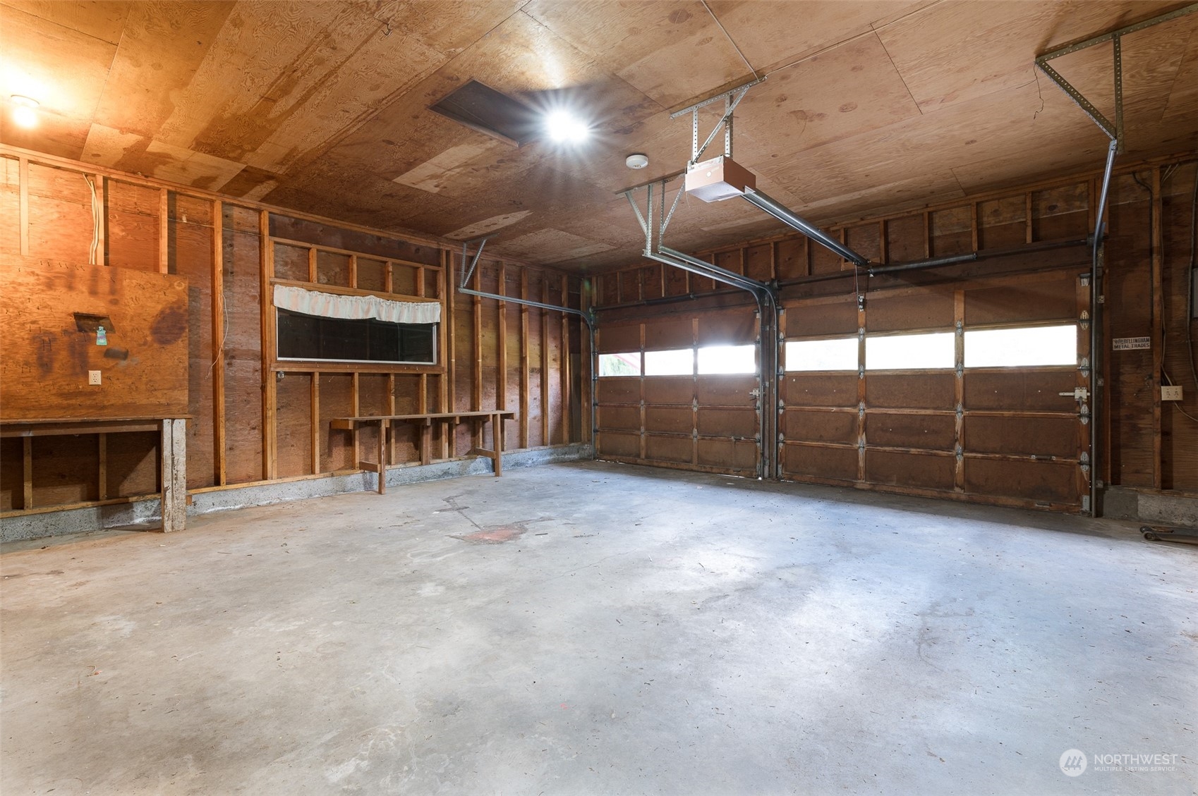 1275 West Axton Road Ferndale, WA 98248 - Photo 17 of 30 a view of empty room with wooden floor and windows