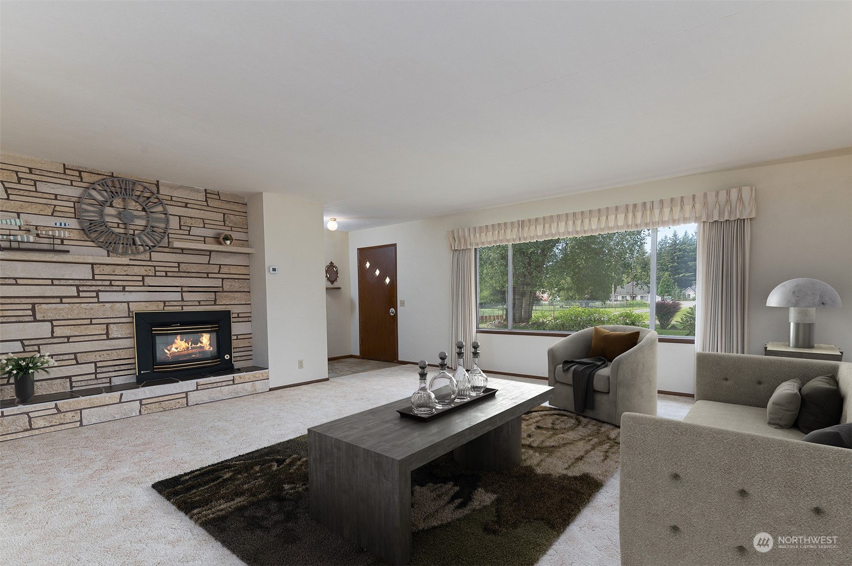 1275 West Axton Road Ferndale, WA 98248 - Photo 2 of 30 a living room with furniture and a fireplace
