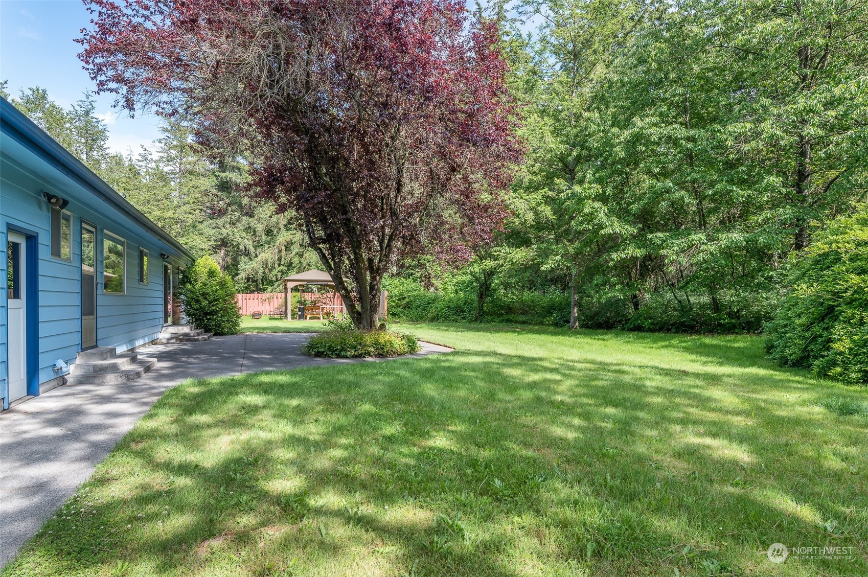1275 West Axton Road Ferndale, WA 98248 - Photo 23 of 30 a view of a trees in a yard with large trees