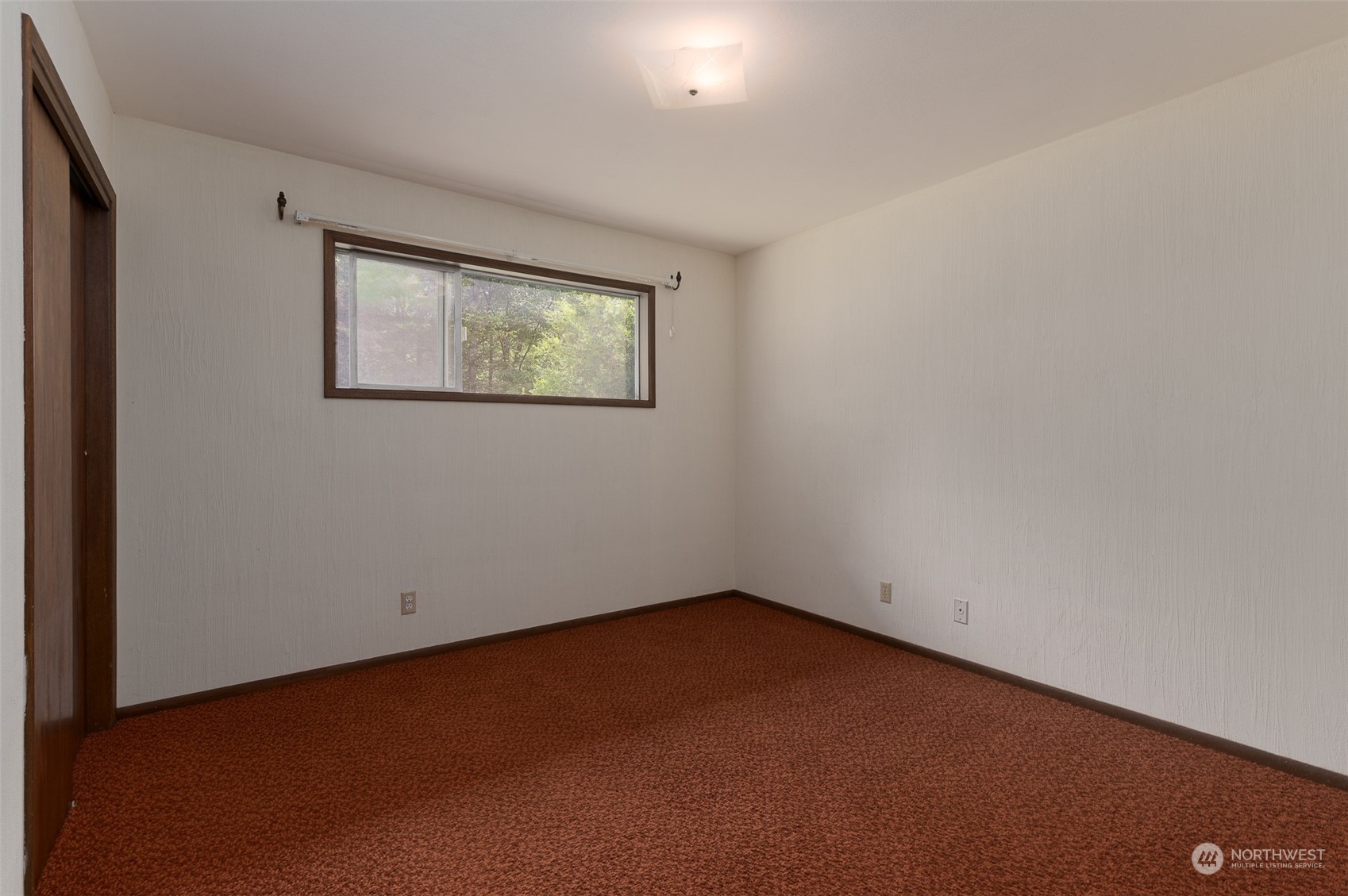 1275 West Axton Road Ferndale, WA 98248 - Photo 5 of 30 an empty room with a window