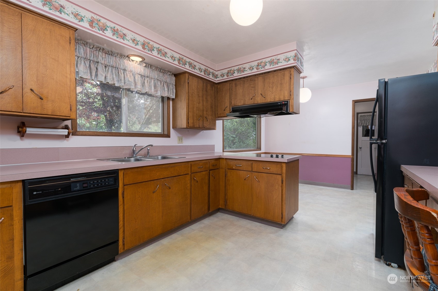1275 West Axton Road Ferndale, WA 98248 - Photo 10 of 30 a kitchen with granite countertop a sink stainless steel appliances a counter space and cabinets