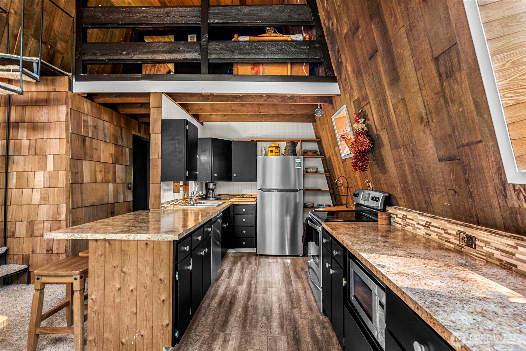 20 Deer Point Lane Ronald, WA 98940 - Photo 14 of 28 a view of a kitchen with a sink and dishwasher with wooden floor