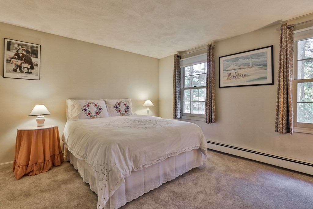 18 Forest Lane Boxford, MA 01921 - Photo 28 of 33 a bedroom with a bed and a window
