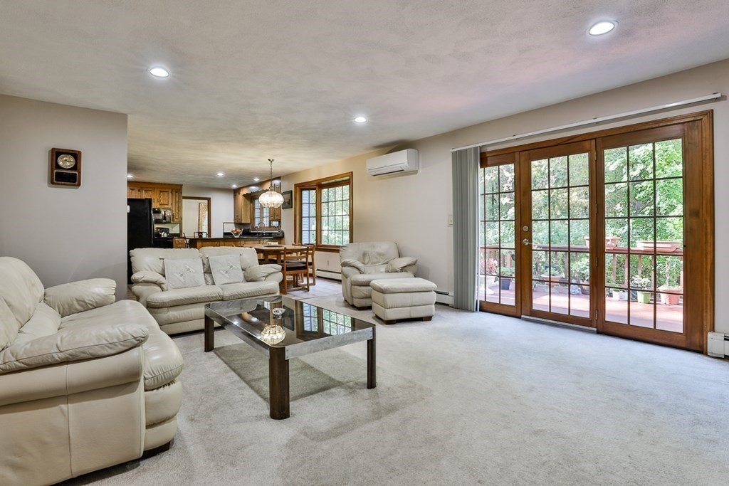 18 Forest Lane Boxford, MA 01921 - Photo 6 of 33 a living room with furniture and a large window