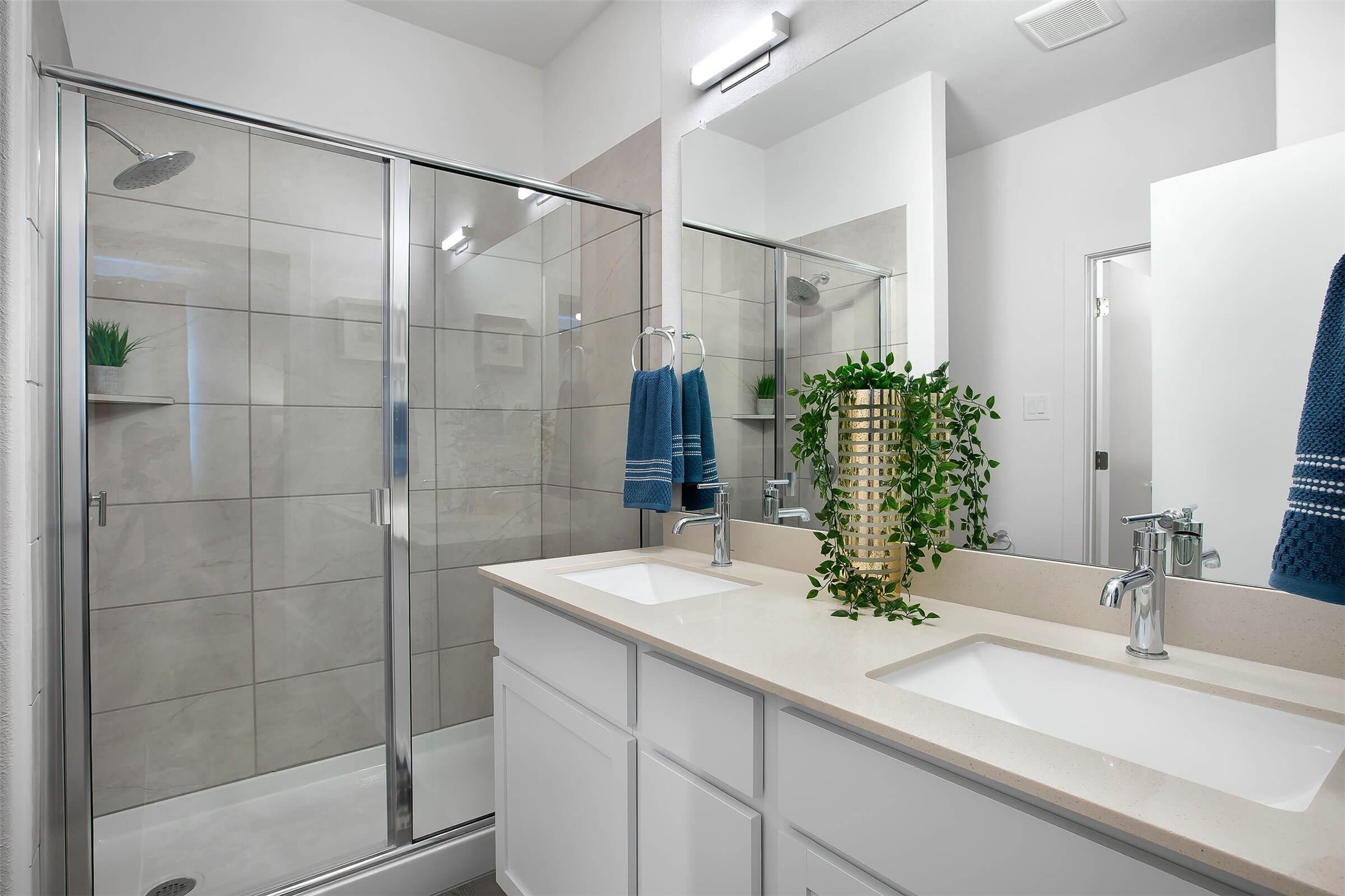 433 Leo Lane Leander, TX 78641 - Photo 12 of 21 Full bath with double vanity and a stall shower