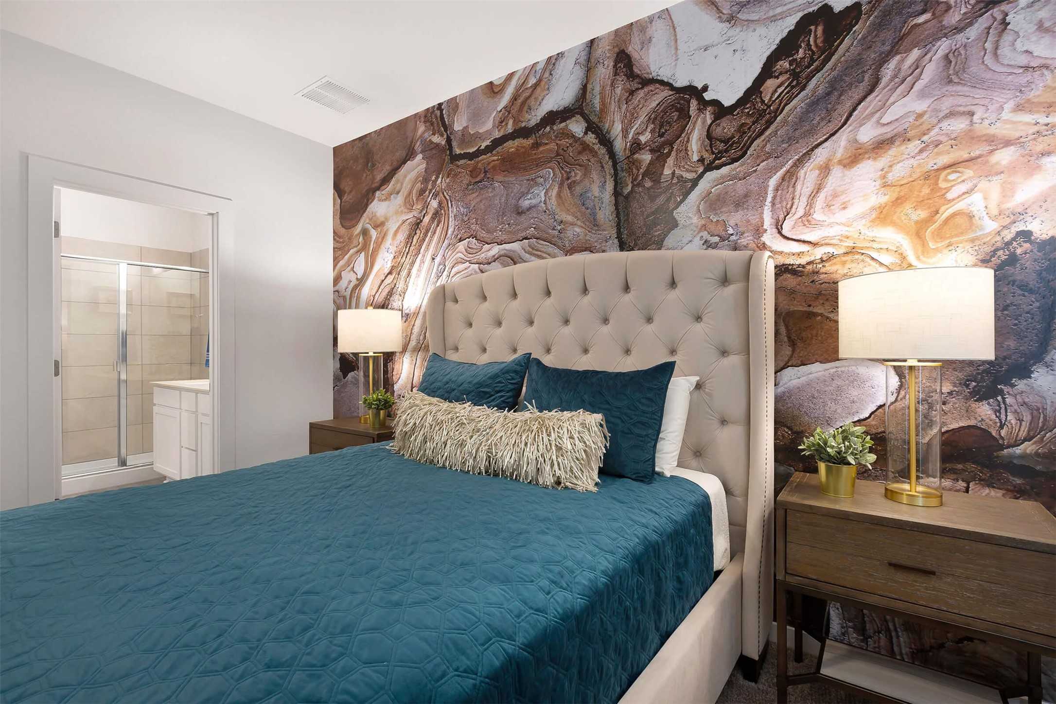 433 Leo Lane Leander, TX 78641 - Photo 8 of 21 Bedroom with ensuite bathroom