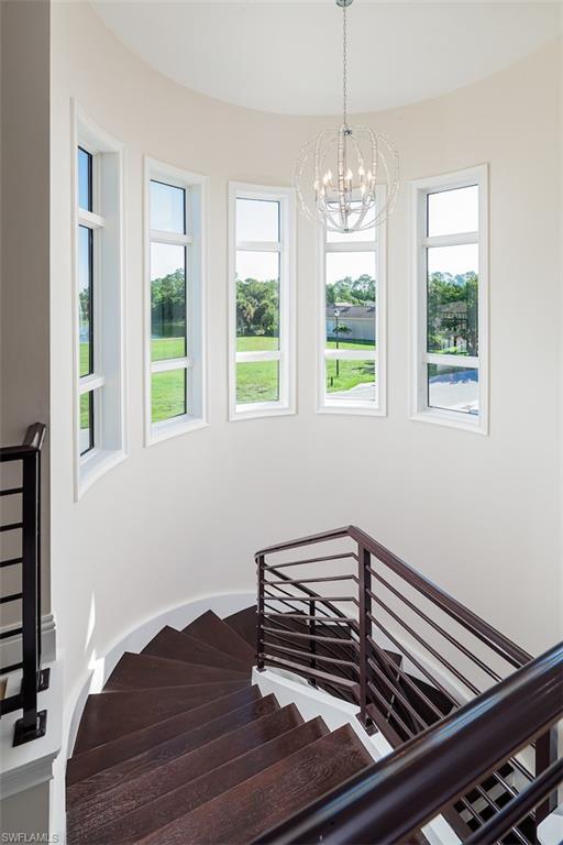 2879 Coco Lakes Drive Naples, FL 34105 - Photo 14 of 30 a view of room with window and wooden floor