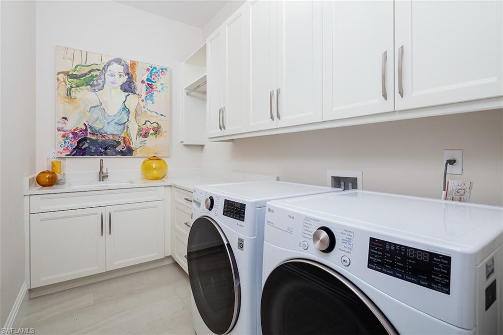 2879 Coco Lakes Drive Naples, FL 34105 - Photo 29 of 30 a utility room with dryer and washer