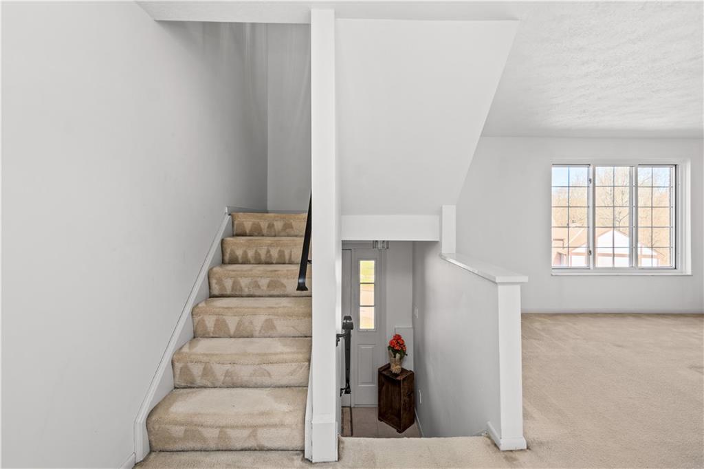 204 Timber Lane Sewickley, PA 15143 - Photo 15 of 25 a view of entryway and hall with wooden floor