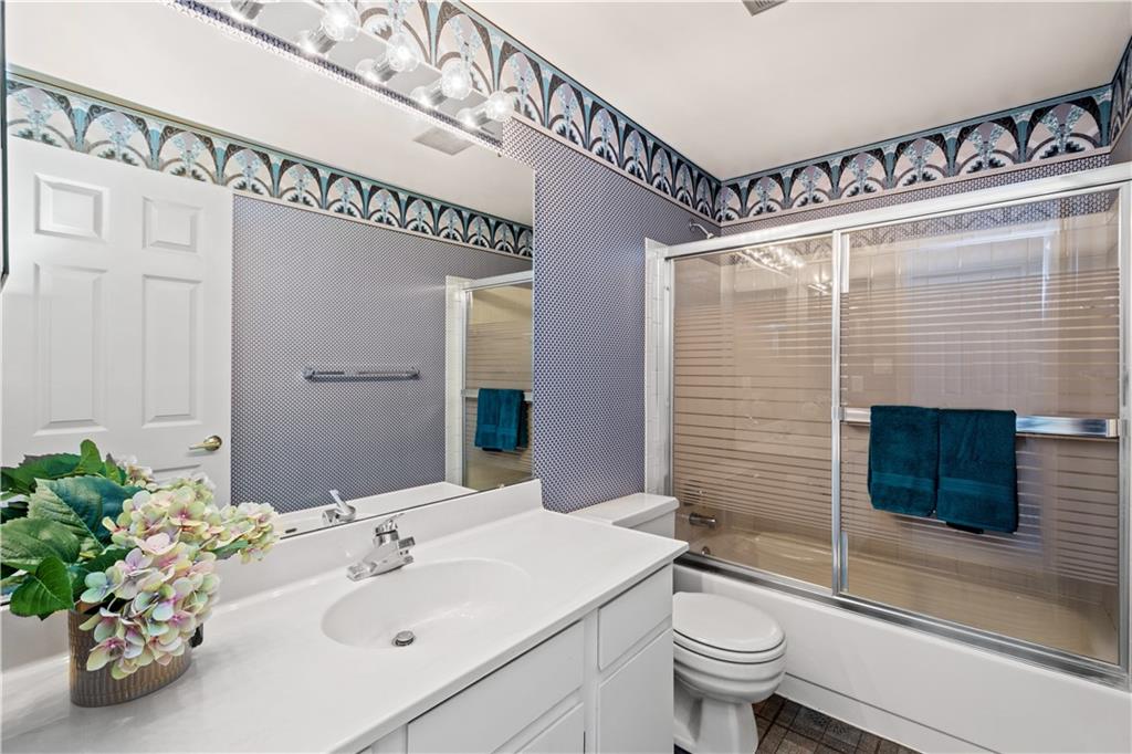 204 Timber Lane Sewickley, PA 15143 - Photo 22 of 25 a bathroom with a sink a toilet and shower