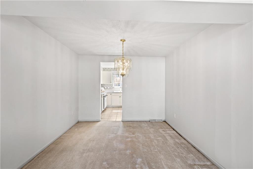 204 Timber Lane Sewickley, PA 15143 - Photo 5 of 25 a view of empty room with wooden floor