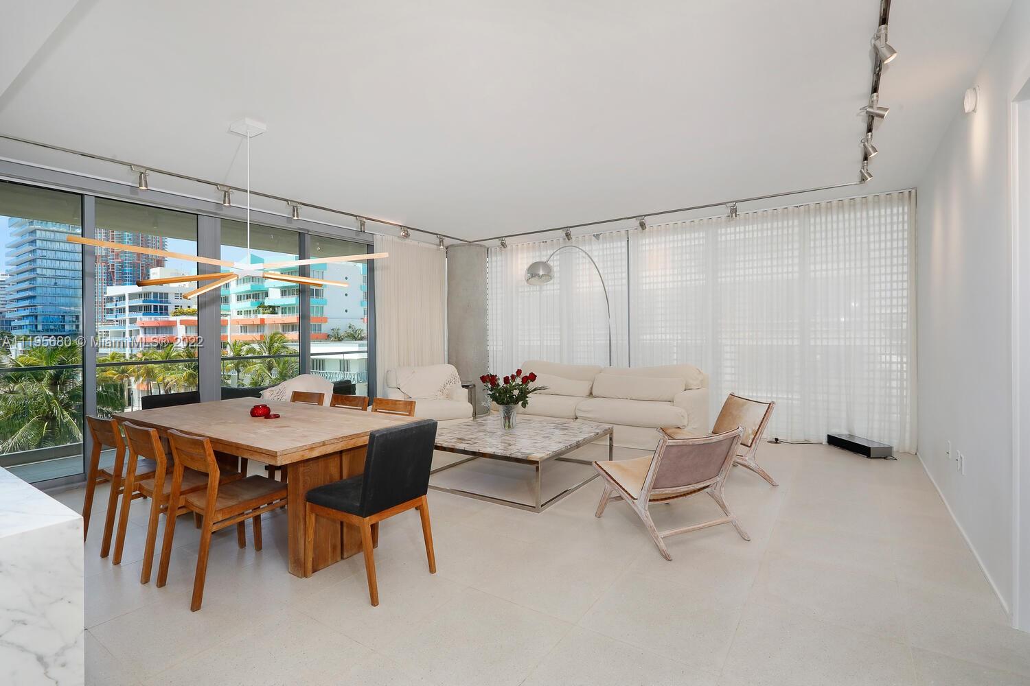 Miami Beach Miami Beach, FL 33139 - Photo 11 of 27 a view of a dining room with furniture window and outside view