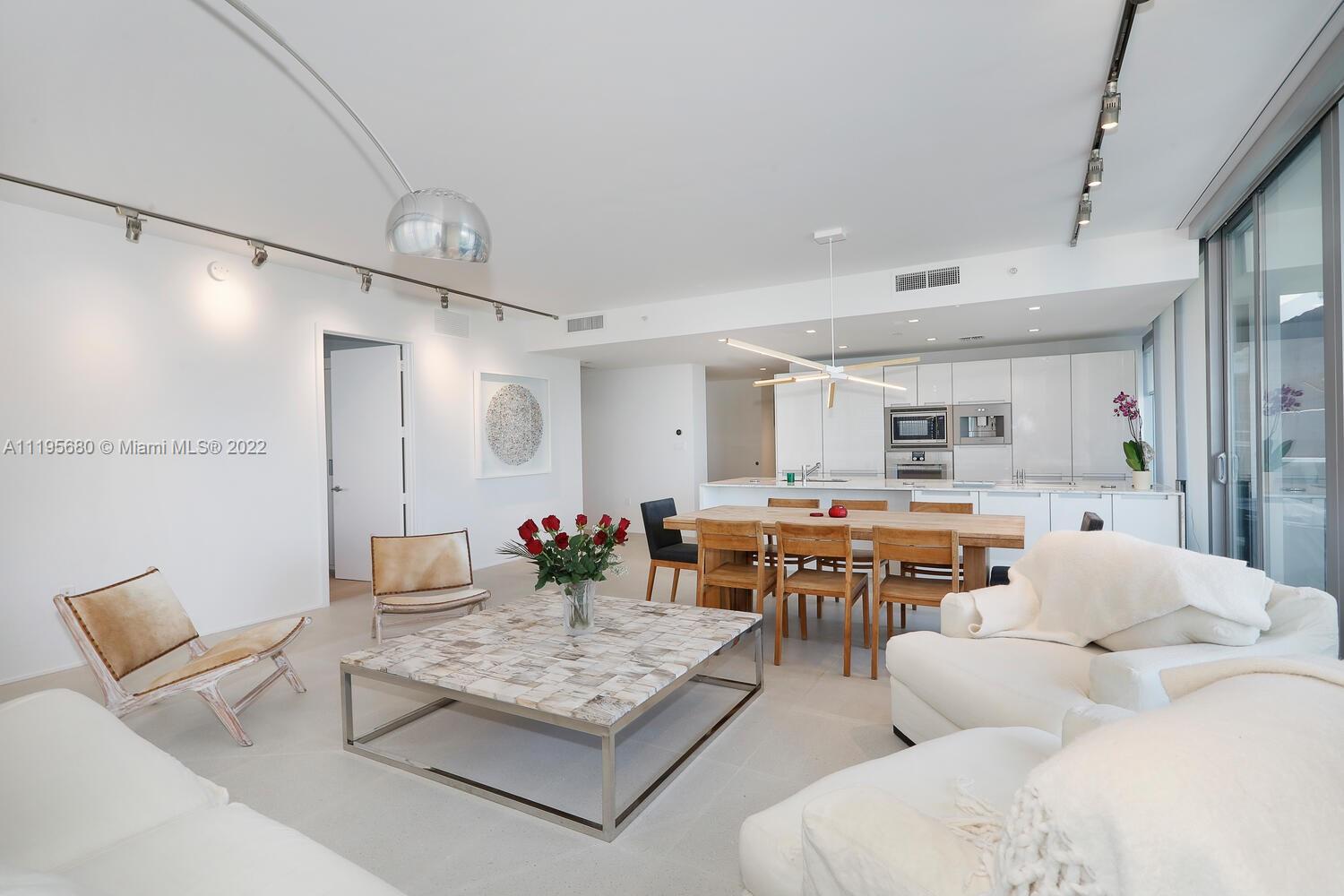 Miami Beach Miami Beach, FL 33139 - Photo 13 of 27 a living room with furniture and wooden floor