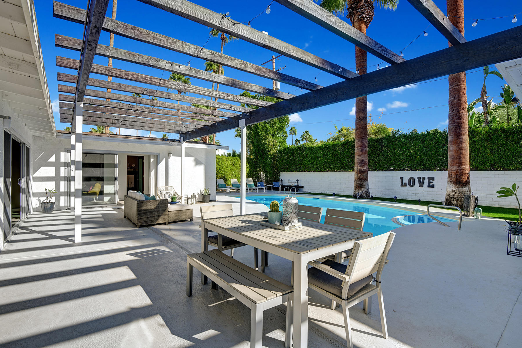 4 Palomino Road Palm Springs, CA 92264 - Photo 5 of 34 TRELISSED PATIO DINING TO POOL AND SPA M