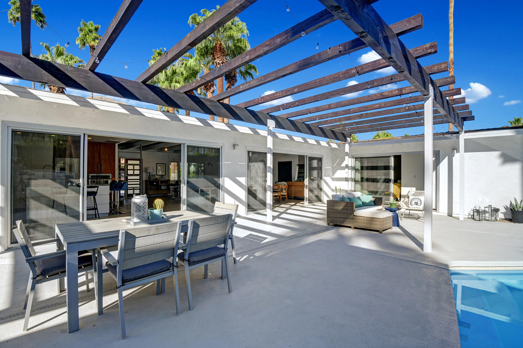 4 Palomino Road Palm Springs, CA 92264 - Photo 7 of 34 TRELISS COVERED PATIO DINING TO BACK OF