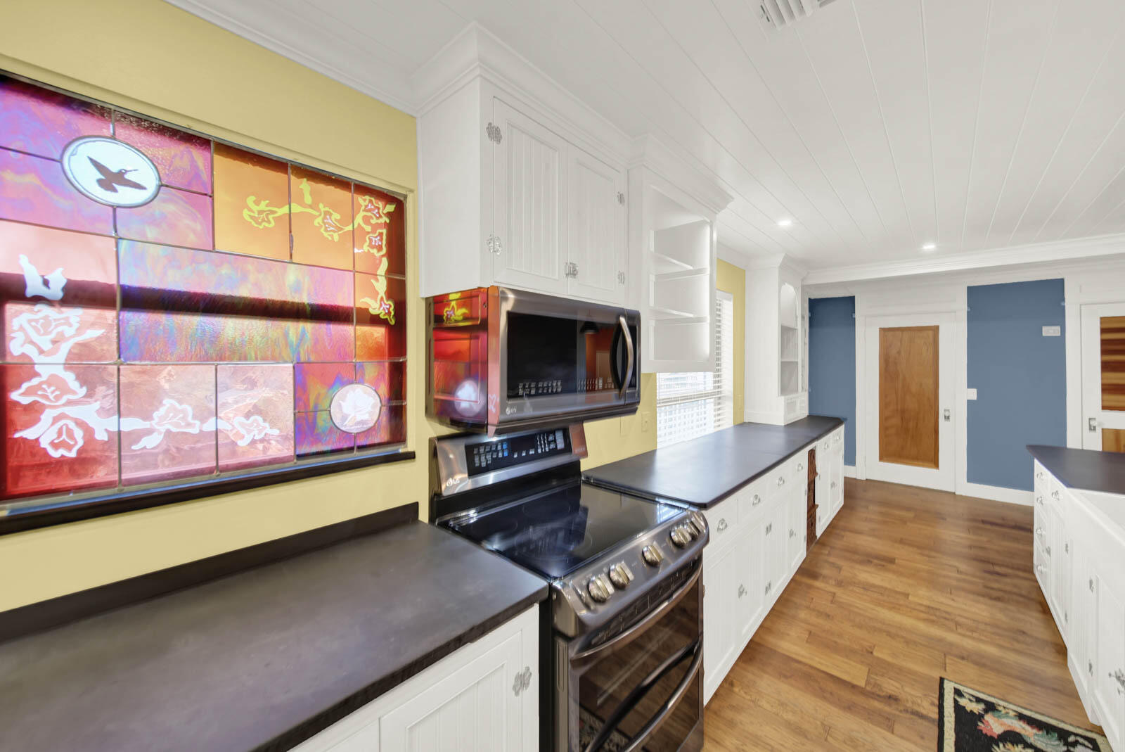 624 Southwest St Lucie Crescent, Unit 306 Stuart, FL 34994 - Photo 12 of 49 a kitchen with stainless steel appliances a stove and a refrigerator