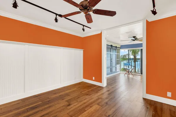 a view of an entryway with wooden floor