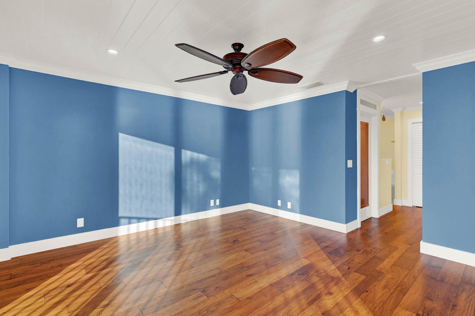 624 Southwest St Lucie Crescent, Unit 306 Stuart, FL 34994 - Photo 29 of 49 a view of an empty room with wooden floor