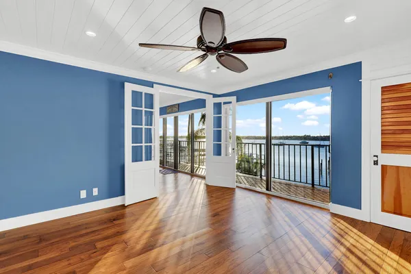 a view of a lake with houses in the back