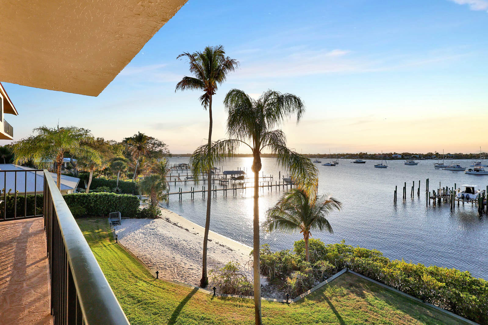 624 Southwest St Lucie Crescent, Unit 306 Stuart, FL 34994 - Photo 37 of 49 a view of a swimming pool with a patio and garden