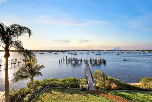 an aerial view of a house with a ocean view