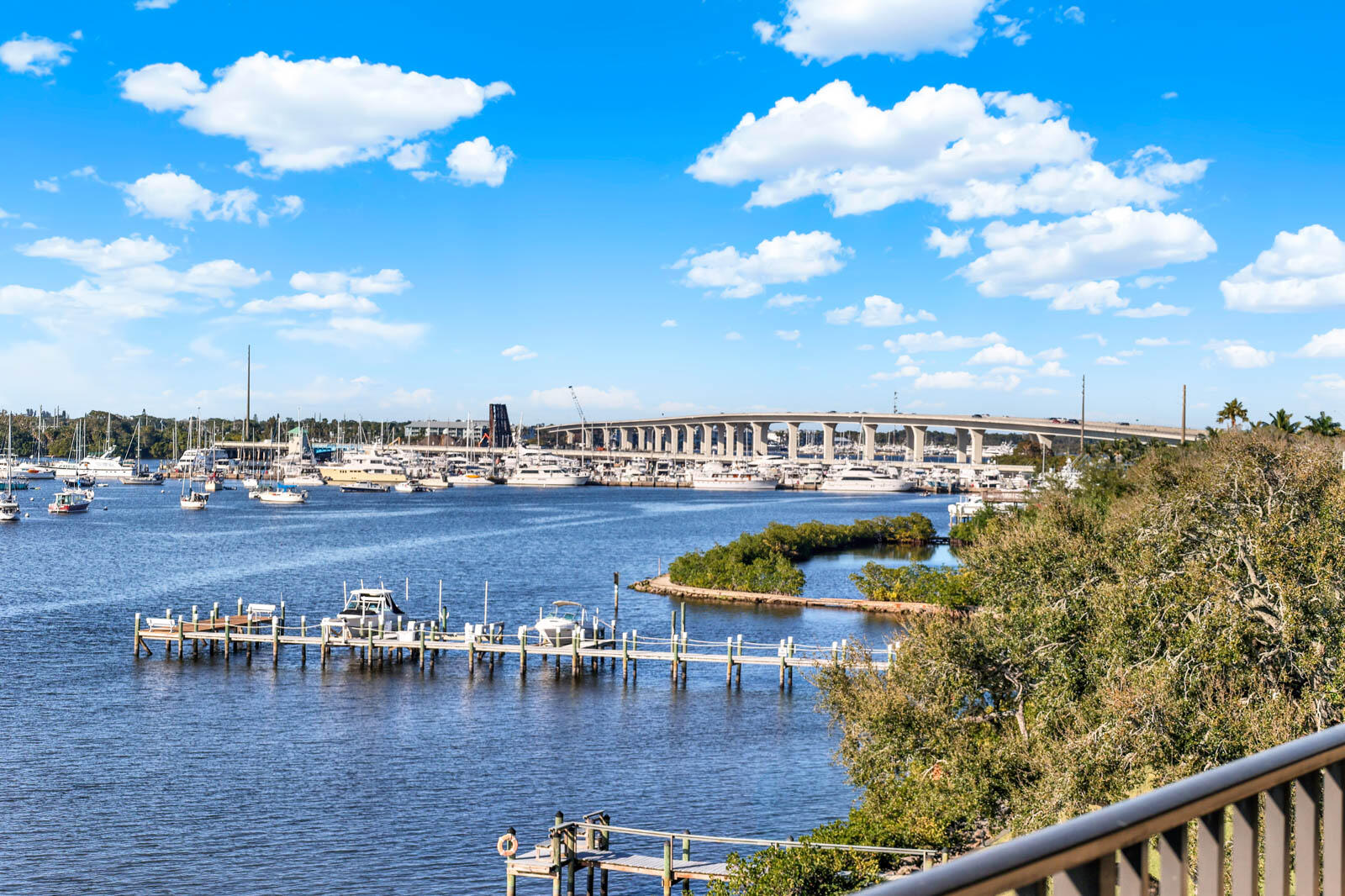 624 Southwest St Lucie Crescent, Unit 306 Stuart, FL 34994 - Photo 39 of 49 a view of a swimming pool with outdoor seating