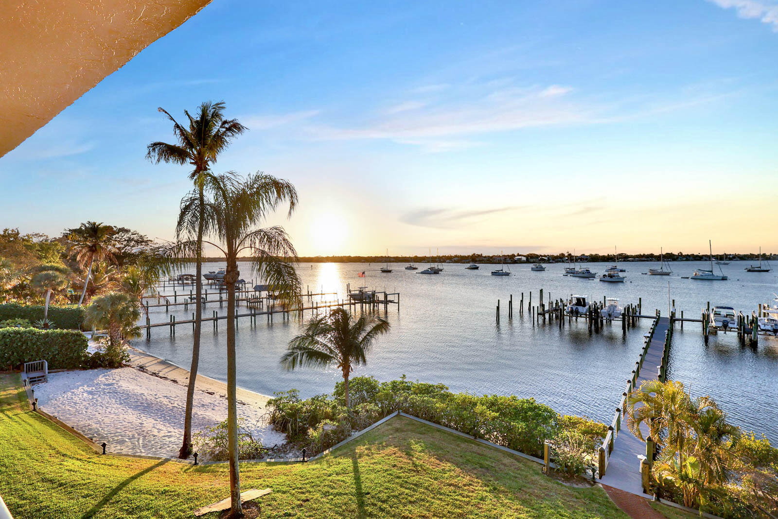 624 Southwest St Lucie Crescent, Unit 306 Stuart, FL 34994 - Photo 42 of 49 a view of a swimming pool with a patio