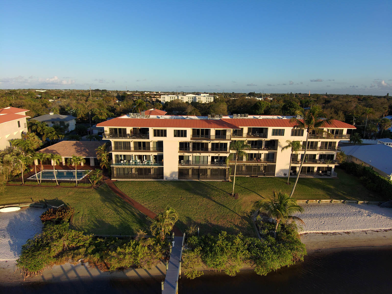 624 Southwest St Lucie Crescent, Unit 306 Stuart, FL 34994 - Photo 43 of 49 a view of a lake with houses