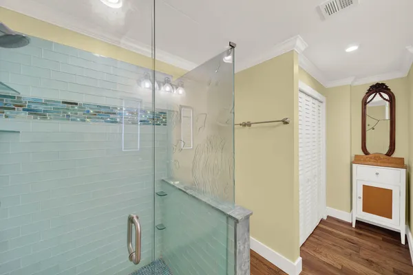 a kitchen with stainless steel appliances a stove and a refrigerator