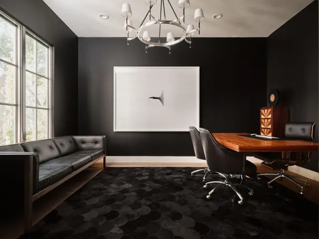 a living room with a couch and a chandelier
